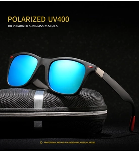 Detail of polarized sunglasses with blue mirrored lenses and black frame on a gift case