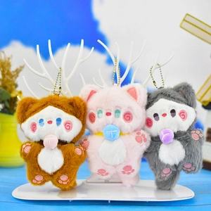 Detailed view of three cute plush cat keychains in brown, pink and grey color variants