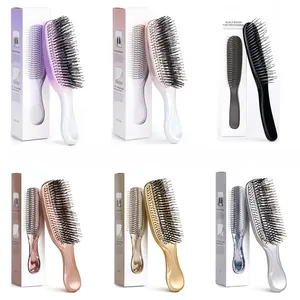 Close-up of ergonomic scalp massage brushes in six metallic electroplated colors