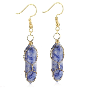 Detail of blue hexagonal natural stone earrings with gold wire wrap and hook ear wires