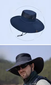 Close-up of breathable mesh vents and adjustable windproof cord on a wide brim sun hat