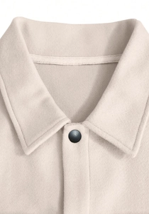 Detail of lapel collar and black button on off-white wool blend casual jacket for men