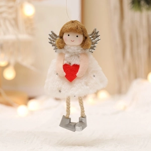 Christmas angel doll ornament with plush wings and red heart on a warm festive background