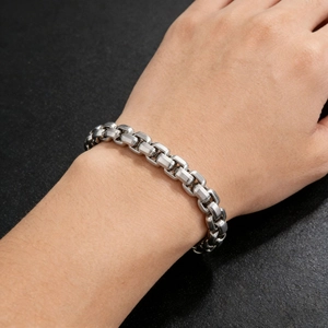 Men's silver stainless steel square pearl box chain bracelet shown on a model's wrist