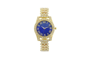 Detail of gold crystal women's watch with blue sunray dial and Roman numerals