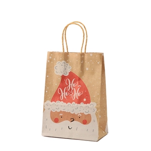 Christmas kraft paper gift bag featuring Santa Claus and artistic HO HO HO lettering
