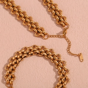 Detailed macro view of 18KGP gold plated chunky chain links and clasp closure details