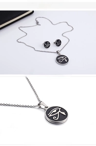 Detailed macro view of Eye of Horus coin pendant and earring set in stainless steel