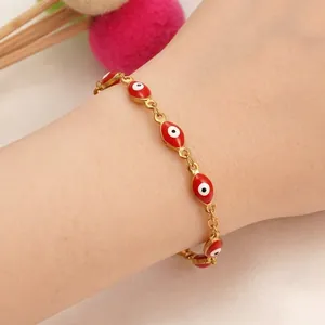 Gold chain bracelet with red Turkish evil eye charms and adjustable lobster clasp