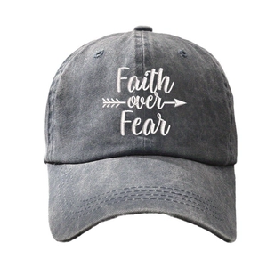 Charcoal grey washed cotton baseball cap with white Faith Over Fear embroidery