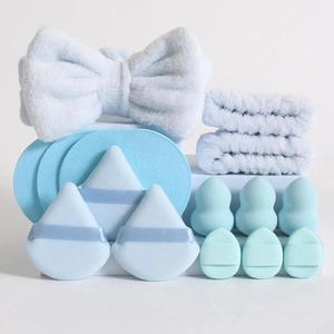 Macro detail of a 15-piece light blue flannel makeup set with headband and wristbands