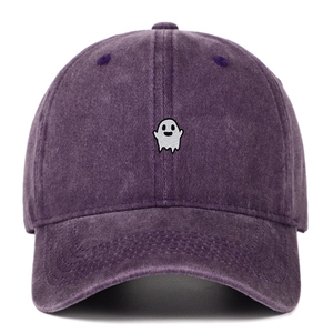 Close-up of small white ghost embroidery on purple washed cotton baseball cap texture
