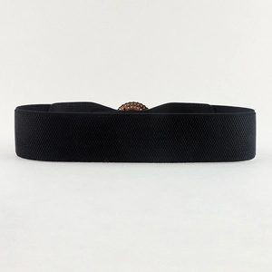 Close-up of black elastic waist belt featuring a geometric buckle with sparkling rhinestones