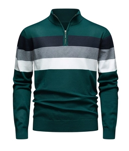 Close-up of slim fit color block knit sweater with quarter-zip standing collar