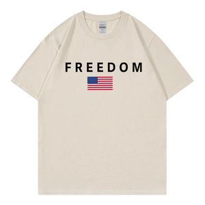 Beige cotton t-shirt with Freedom print and US flag, flat lay view on white background