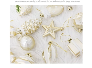 Detailed flat lay of gold and white Christmas ornaments on soft white plush background