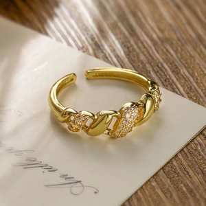 Elegant 18K gold-plated twisted ring with white zircon pave and adjustable opening