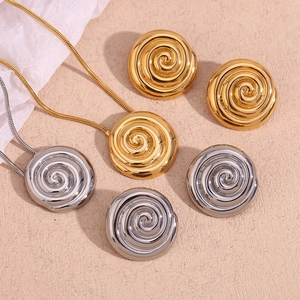 Spiral swirl pendant necklace and earring jewelry set in polished gold and silver finishes