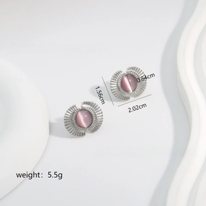 Detail showing pink cat eye stone on silver fan-shaped earrings with size dimensions