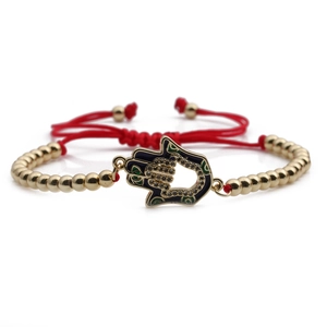 Adjustable red Hamsa hand bracelet with gold beads and turquoise enamel charms