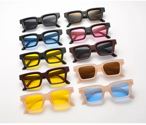 Flat lay of retro square sunglasses in ten assorted jelly colors and diverse lenses