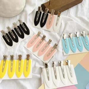 Colorful leaf-shaped seamless hair clips set in black pink blue yellow and white