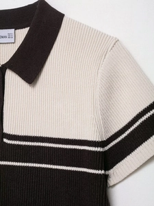 Detail of a brown and cream ribbed knit striped Polo shirt with soft fabric texture