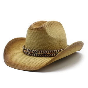 Classic woven paper straw cowboy hat with decorative band on white background