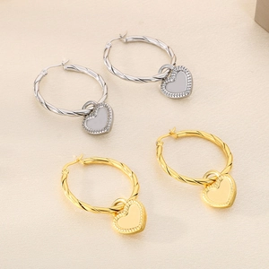 Twisted rope hoop earrings with heart charms in gold and silver stainless steel