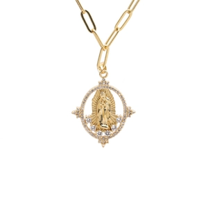 Gold paperclip chain necklace with a zircon-encrusted oval religious pendant on white background