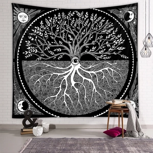 Detailed macro view of black and white Tree of Life tapestry on white brick wall background