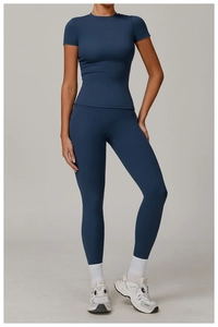 Detail of navy blue high-stretch yoga set with slim short sleeve tee and leggings
