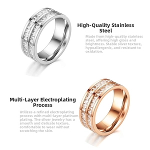 Close-up of double-row square zircon stones on silver and rose gold stainless steel rings