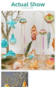 Detailed view of hand-painted glass sea animal ornaments with pearls and glitter