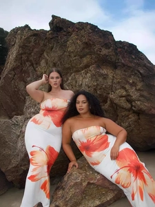 Floral tube top maxi dress with orange hibiscus print for beach resort vacations