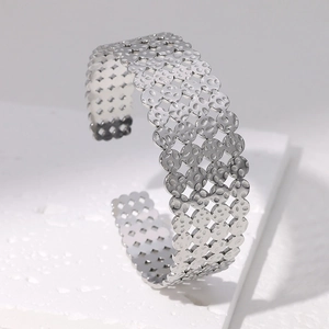 Chic silver hollow clover pattern stainless steel open bangle for women with luxury finish