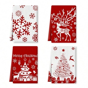 Set of four Christmas microfiber tea towels with festive reindeer and snowflake patterns