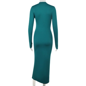 Vue arrière d'une robe moulante à manches longues vert foncé avec patchwork en mesh
