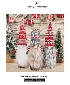 Close-up of Christmas gnome wine bottle covers with knitted hats and faux fur beards