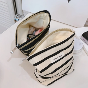 Striped canvas cosmetic bag set with zipper and simple wish label in black and white