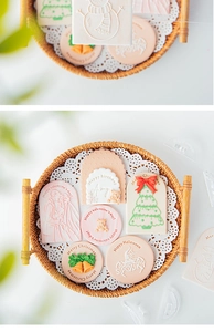 Macro detail of Christmas and holiday themed cookie fondant stamps on cookies