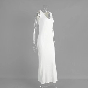 Detail view of white ribbed knit dress with V-neck sleeveless cut and slim fit texture