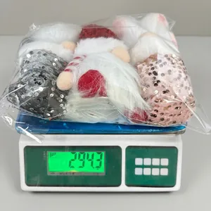 Three-piece set of sequined Christmas gnomes in festive colors weighing 294 grams