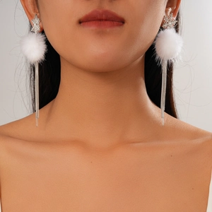 Sparkling snowflake earrings with white faux fur poms and long silver tassel chains