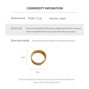 Detail shot showing the 6cm diameter dimensions of this layered gold-plated copper bangle