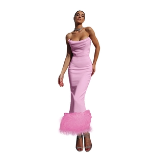 Pink strapless bodycon maxi dress featuring a chic feather hem for cocktail parties