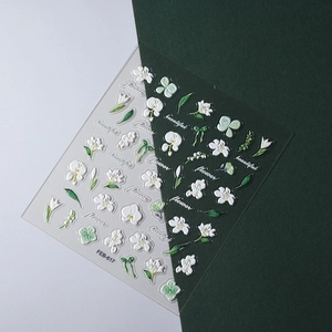 5D embossed nail art stickers featuring white floral patterns and green leaves, model FEB-617
