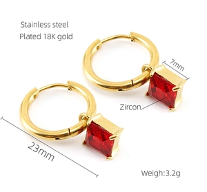 Detailed view of 18K gold plated stainless steel earrings with red square zircon