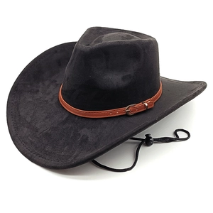 Detail of black suede cowboy hat featuring brown leather band and adjustable chin strap