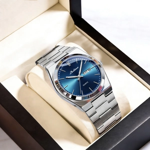 Close-up of Dedima quartz watch with blue dial and day-date display in a gift box